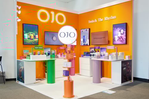 Ojo Candles booth at Atlanta Market